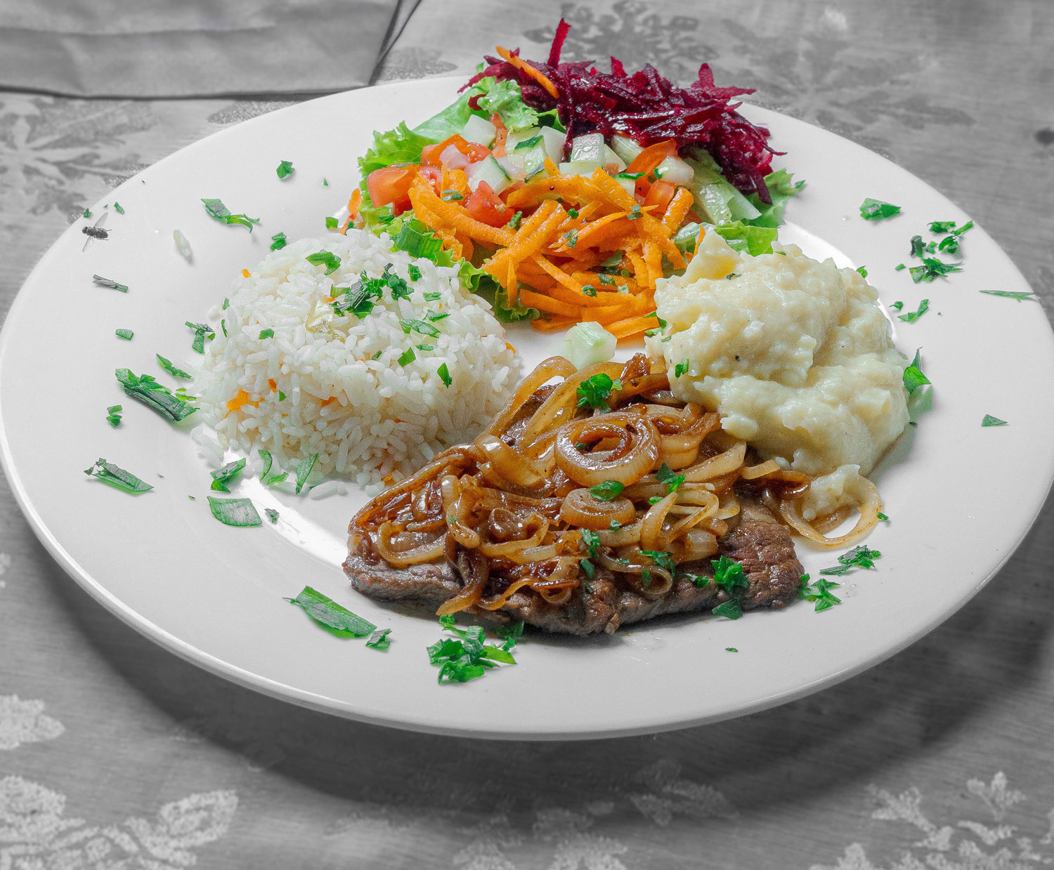 Bistec Encebollado